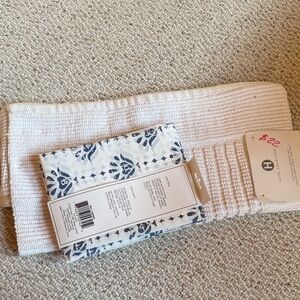 Hotel Collection Cream rug and blue and white tub curtain